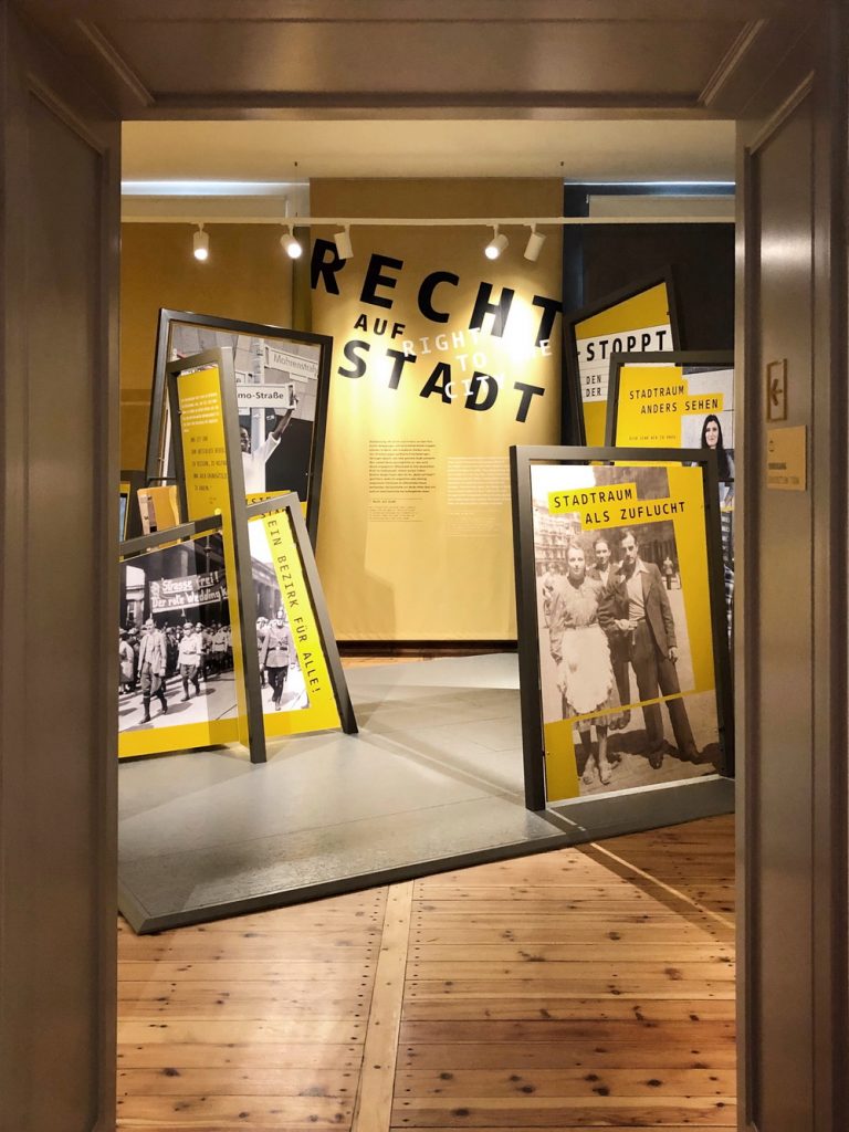 Room with yellow and black posters