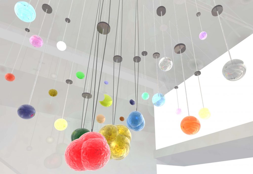 Colourful glass spheres hanging from a ceiling