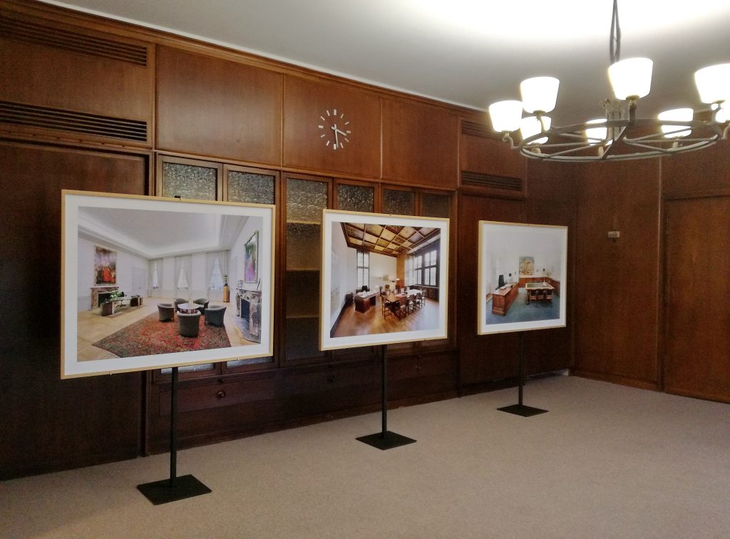 Pictures of offices in a wood panelled room